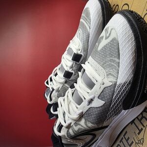 SOLD 🚫 Stylish Black and White Athletic Shoes